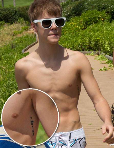 justin bieber tattoo 2011 jesus. Justin Bieber#39;s Tattoos
